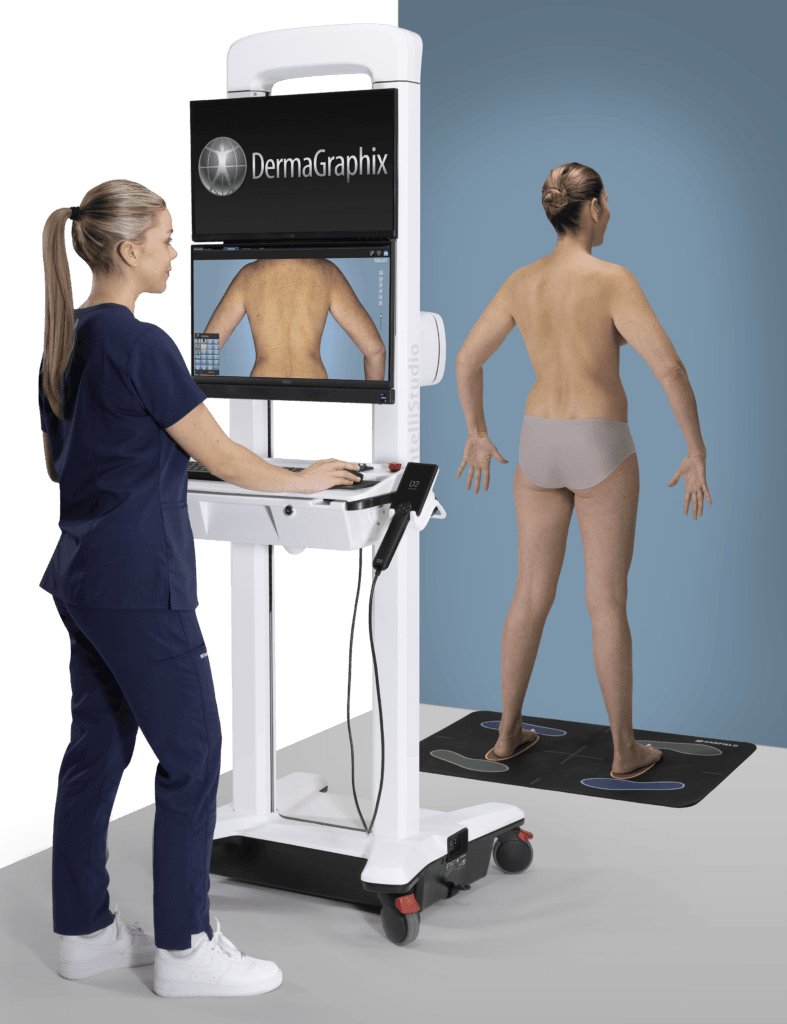 Clinician operating the Canfield IntelliStudio system to capture full-body skin images of a patient.