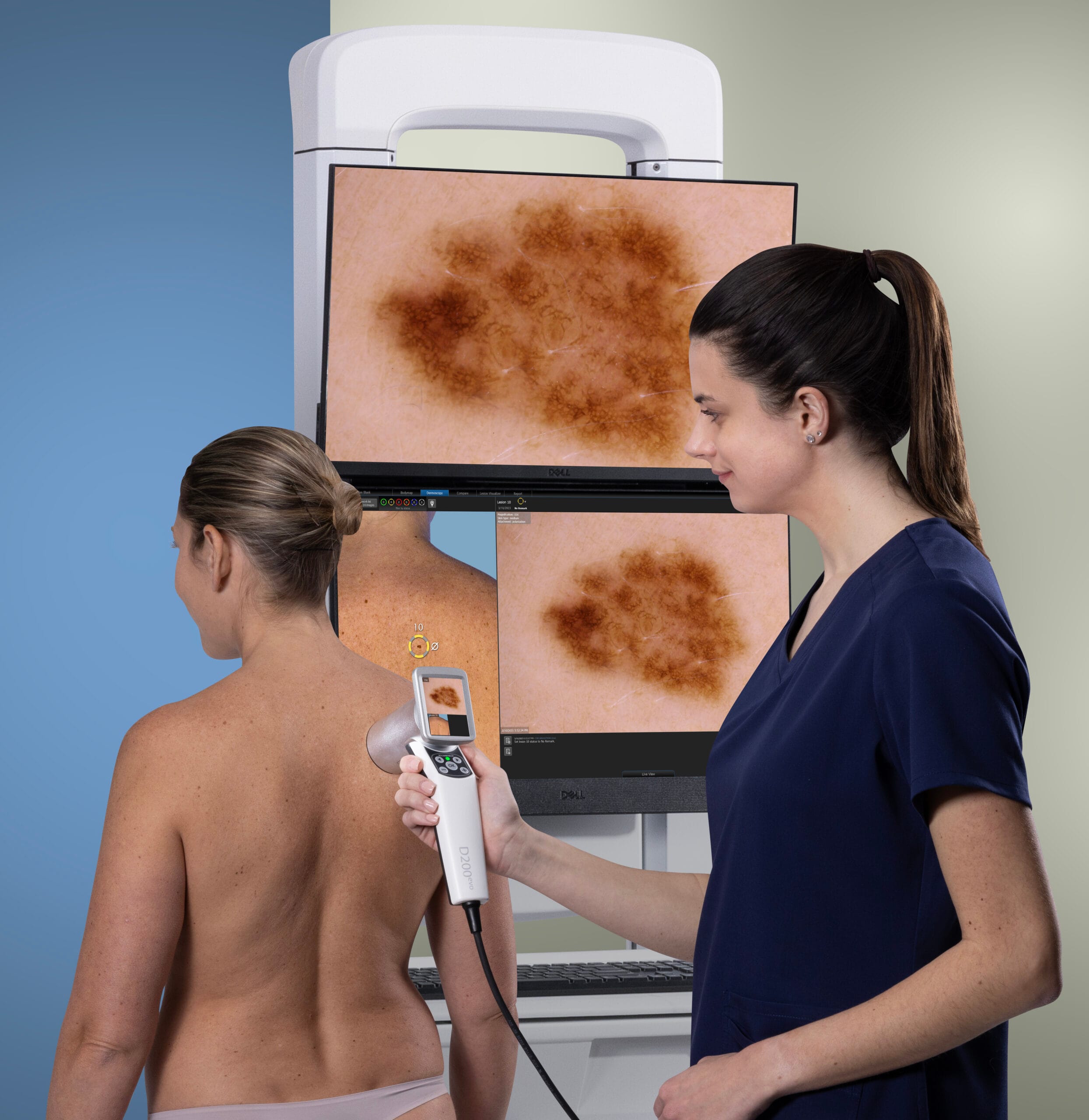 Clinician reviewing detailed skin images with a patient using the IntelliStudio imaging system.